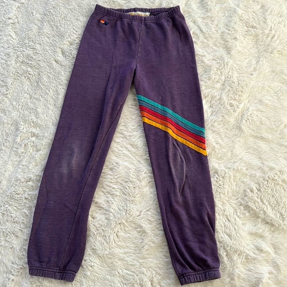 Aviator Nation kids/tween sweatpants purple and rainbow stripe. size 12.